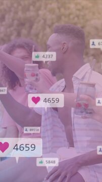 Social media likes and comments animation over friends celebrating by poolside