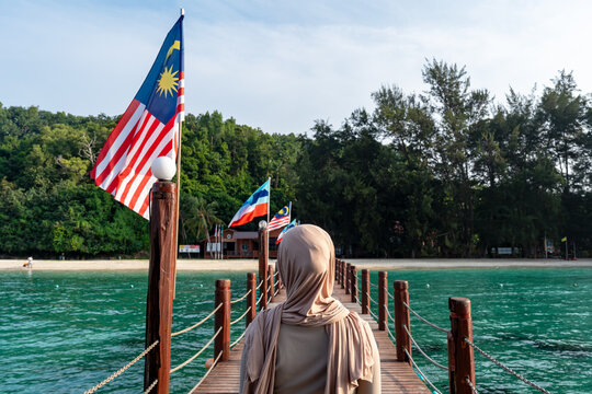 Rear view of a beautiful young woman at Manukan island Sabah Borneo Malaysia