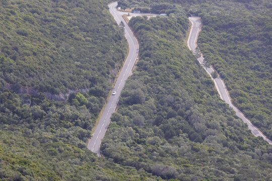 Winding road through serra da arr&aacute;bida mountain