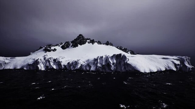 silent sentinel glacier island standing over dark sea, brooding horizon and still atmosphere convey timeless polar solitude and watchful calm.