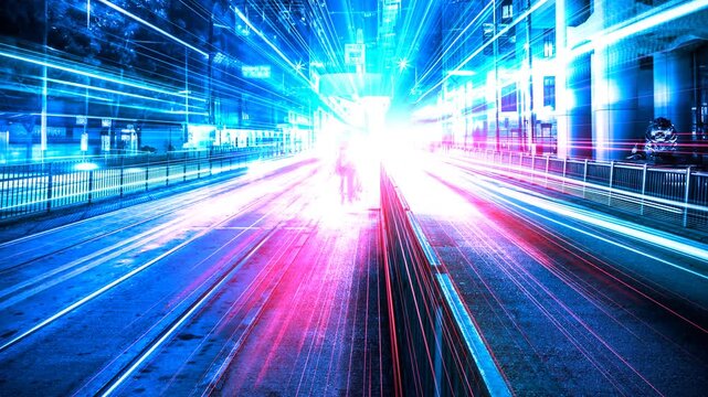 Dynamic streaks of colorful light and motion blur on a city road at night