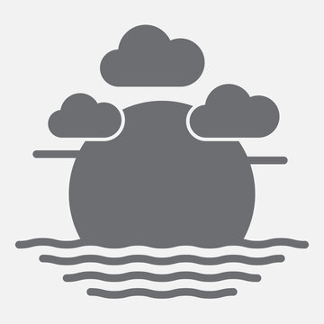 Sunset with clouds at sea solid icon, dusk concept. Vector graphics. Evening sky sign with glyph style icon for mobile or web design