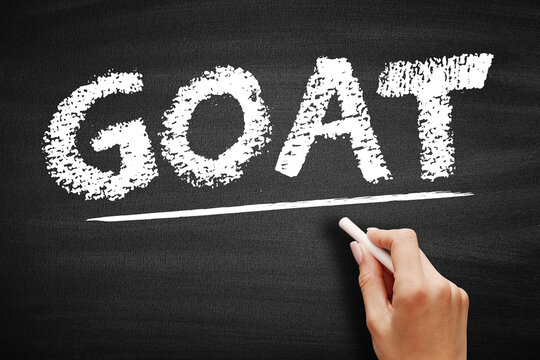 GOAT stands for Greatest of All Time, a term used to describe an individual who is considered the best in their field, displayed in chalk on a classic school chalkboard