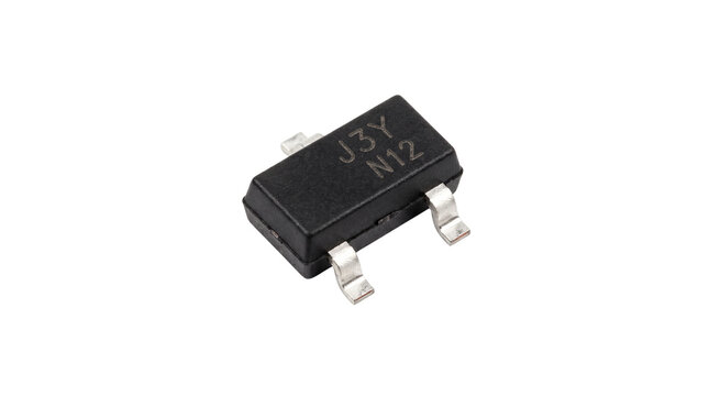 Small SOT-23 surface mount transistor electronic component for integrated circuits and PCB assembly isolated on transparent background