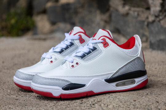 White red leather sneakers pair
