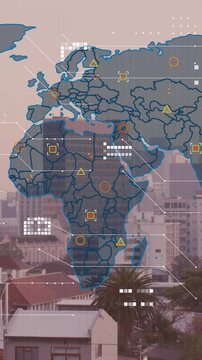 Animation of world map and data processing against aerial view of cityscape