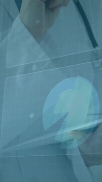 Doctor using tablet with medical data processing animation overlaid