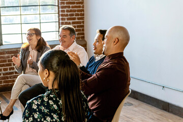 Obraz premium Team meeting with diverse professionals.
