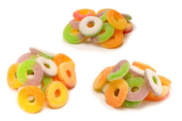 Naklejka premium Assorted gummy candies isolated on a white background. Top view.