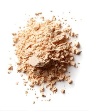 Fine beige cosmetic powder heap with soft granulation detail, beauty ingredient texture isolated on white background
