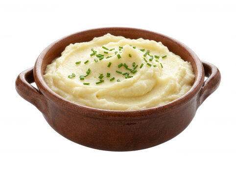 Creamy mashed potatoes in brown clay bowl isolated on transparent background