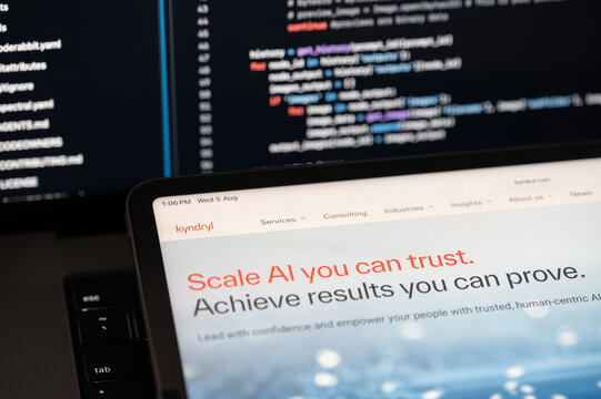 Kyndryl Ai company web page on program code background
