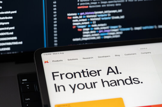 Mistral Ai company web page on program code background