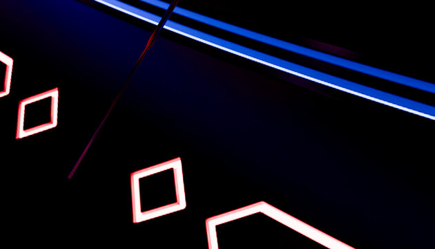 Close-up of modern clock face with glowing geometric shapes and clock