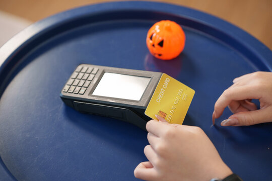 Credit card payment transaction processed on terminal machine over table