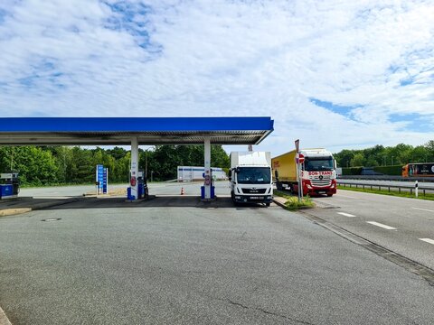 Hamburg, Germany - 26. June 2026: Trucks refueling at German highway rest area gas station