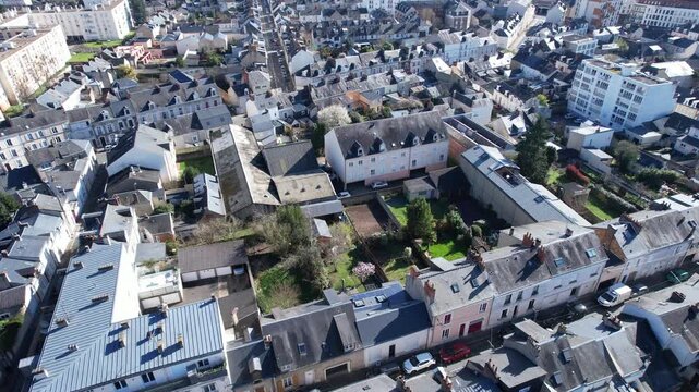 Overhead dense slate roofs and courtyards in a French city center