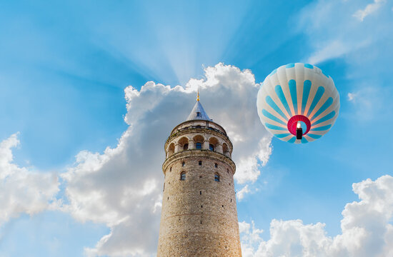 Hot air balloon flying over Galata tower, istanbul 