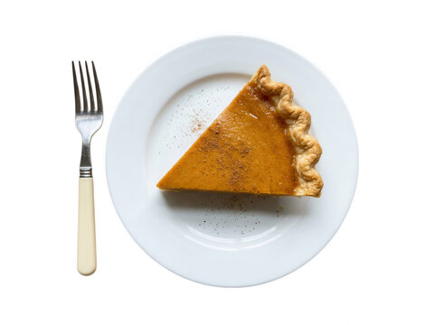 Pumpkin pie slice on plate with fork isolated on transparent background