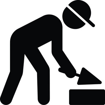 Simple black icon of a construction worker wearing a hard hat using a trowel to lay bricks