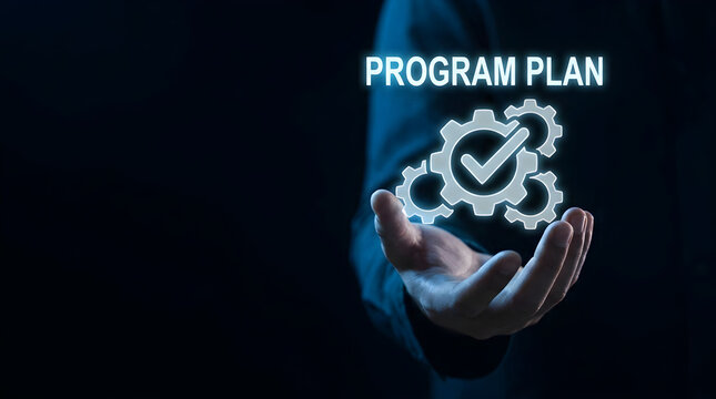 Person holding a digital program plan icon with gears