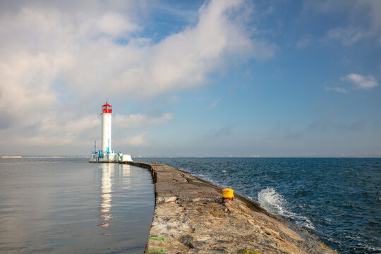 Concrete Pier and Old Lighthouse