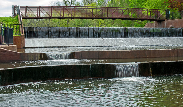 Bridge over tiered waterfall