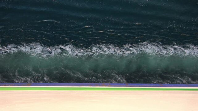 Ferry boat sailing creating waves on the sea surface