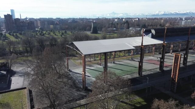 Aerial view of Parco Dora public park and sports facility built inside former industrial complex in Turin, Italy