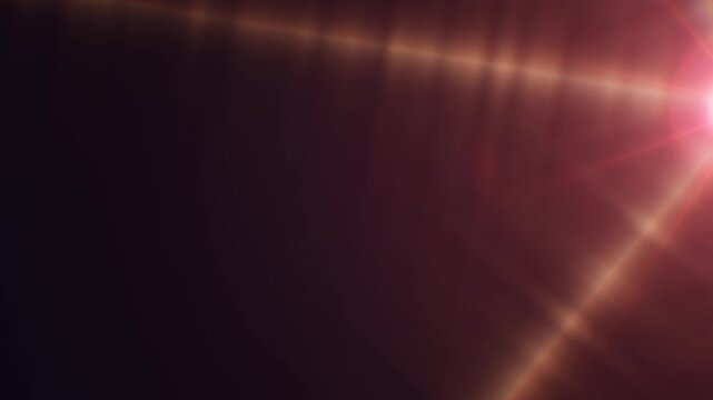 A bright and realistic lens flare effect with dynamic light on a dark background