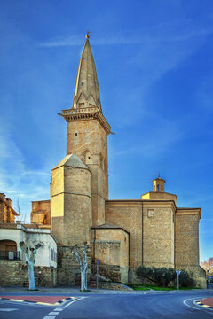 San Pedro Church tower in Olite, Spain, low angle view. Famous gothic needle spire and medieval religious architecture