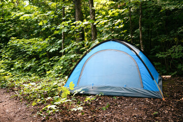 Wild camping tent in a great forest © Louis-Paul Photo
