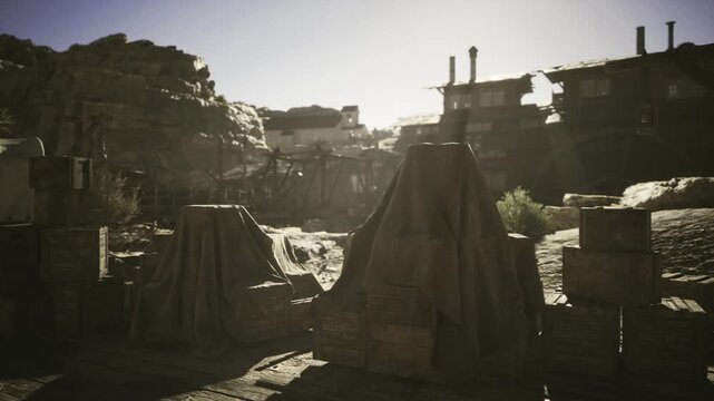Sunwashed makeshift camp with canvas tents and stacked crates sandy ground tool shadows scattered debris isolated desert settlement abandoned mining vibe