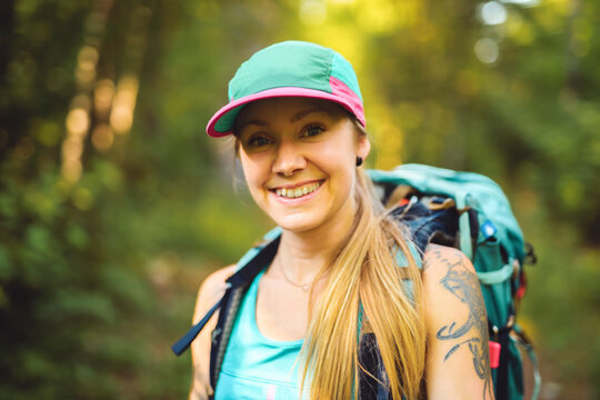 woman trekking in the forest. Traveling activity