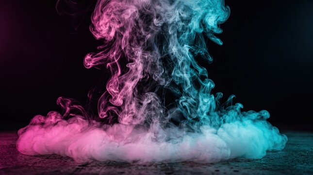 Thick plumes of pink and cyan stage smoke billowing upward from a dark textured floor against a black background