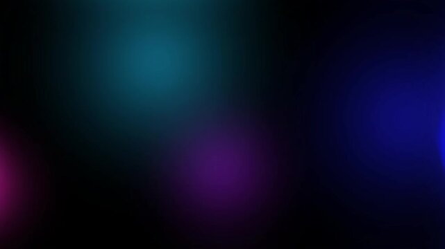 Abstract blue and purple bokeh lights on dark background