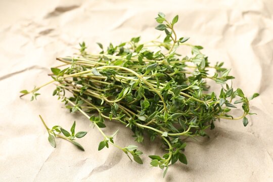 Bunch of fresh thyme on kraft paper, closeup