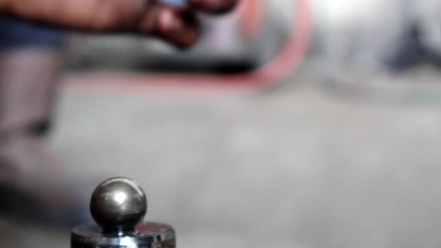 Mechanic Pressing Helical Gear with Bearing Puller Tool.