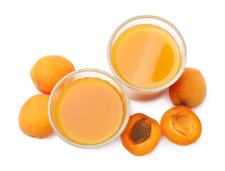 Apricot juice in glasses and fresh fruits isolated on white, top view © New Africa