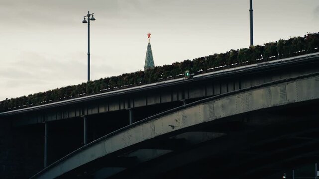 Moscow kremlin tower seen from a moving boat on the moskva river