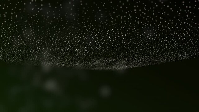 A serene, ethereal cloud of tiny white particles drifting upward in a deep indigo background