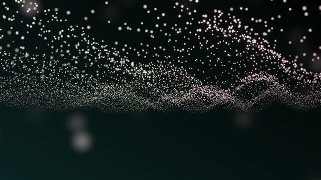 A mesmerizing wave of luminous particles drift across a deep, dark background