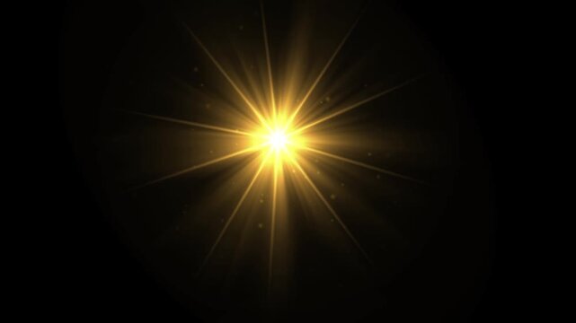 Glowing star with light rays effect on plain black background