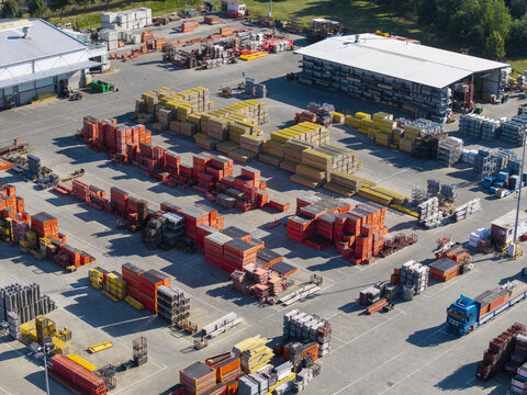 Aerial view of the PERI Polska Sp. z o.o. facility in Jaworzno, featuring organized rows of construction formwork, scaffolding, and industrial warehouses. Jaworzno, Wojewodztwo slaskie, Poland.