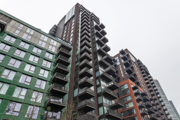 Modern high rise apartment building in city © SellStock