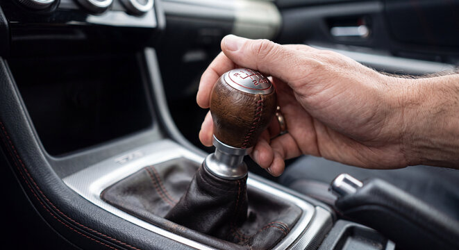 man driving car