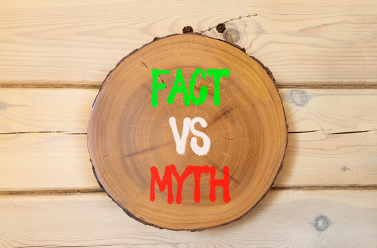 Fact vs versus myth words symbol. Concept words Fact vs Myth on beautiful wooden circle. Beautiful wooden wall background. Business and fact vs versus myth concept. Copy space.