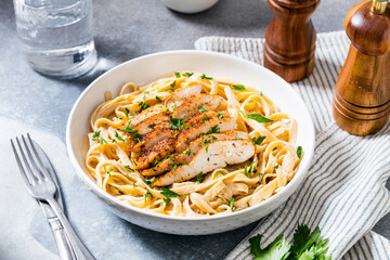 Naklejka premium Homemade Chicken Fettuccine Alfredo Pasta