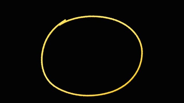 Animated yellow hand drawn circles on a black background. 4K Video