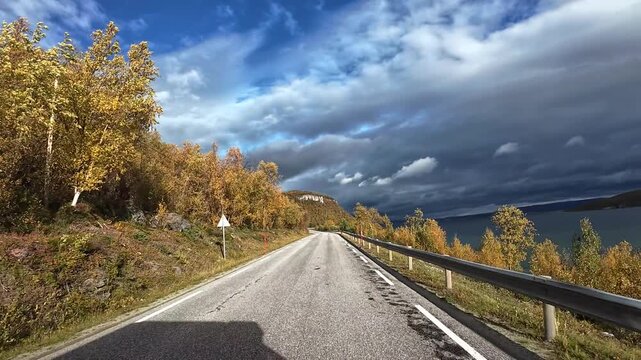 Driving a motorhome on a road to Nordkapp, Norway